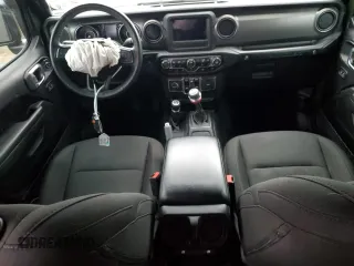2023 Jeep Wrangler Sport S with VIN 1C4HJXDG1PW504242, listed as a Copart auction lot 83772924 with 29,237 mi miles and Salvage Title. Bid and sale history available at DreamBid. Image 8.