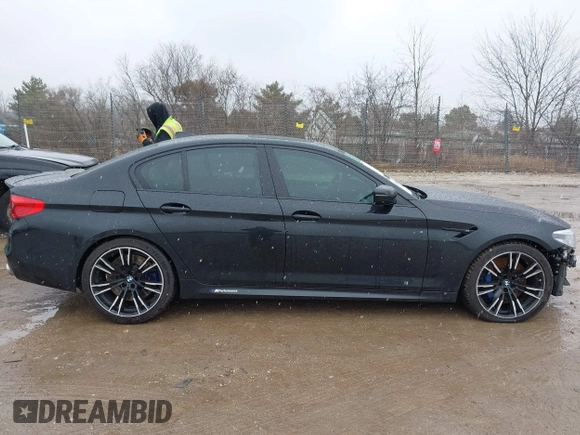 2020 BMW M5 Competition z VIN WBSJF0C00LCD37331, wystawiony jako IAAI lot #41738410 z przebiegiem 49 788 mil mil oraz . Historia ofert i sprzedaży dostępna na DreamBid. Obrazek 13.