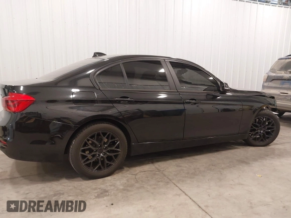 2018 BMW 3 Series 320i xDrive with VIN WBA8E5G5XJNU46855, listed as a IAAI auction lot 41526290 with 68,720 mi miles. Bid and sale history available at carsss.com. Image 14.