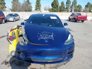 2018 Tesla Model 3 Long Range Battery with VIN 5YJ3E1EA4JF011799, listed as a IAAI auction lot 41765860 with 133,098 mi miles. Bid and sale history available at carsss.com. Image 12.