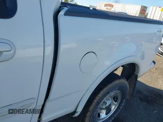 2003 Ford F-150 XLT with VIN 1FTRW08633KD11896, listed as a IAAI auction lot 42137360 with 118,654 mi miles. Bid and sale history available at carsss.com. Image 12.
