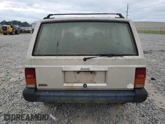 1995 Jeep Cherokee Sport with VIN 1J4FJ68S4SL618773, listed as a Copart auction lot 74126954 with 318,519 mi miles and Salvage title. Bid and sale history available at DreamBid. Image 6.