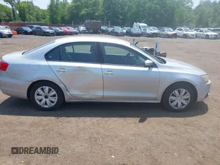 2012 Volkswagen Jetta SE z VIN 3VWDP7AJ5CM309927, wystawiony jako IAAI lot #42414951 z przebiegiem 128 109 mil mil oraz . Historia ofert i sprzedaży dostępna na DreamBid. Obrazek 13.