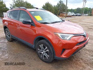 2016 Toyota RAV4 LE with VIN JTMZFREV9GJ074360, listed as a IAAI auction lot 42013611 with 87,578 mi miles. Bid and sale history available at carsss.com. Image 1.