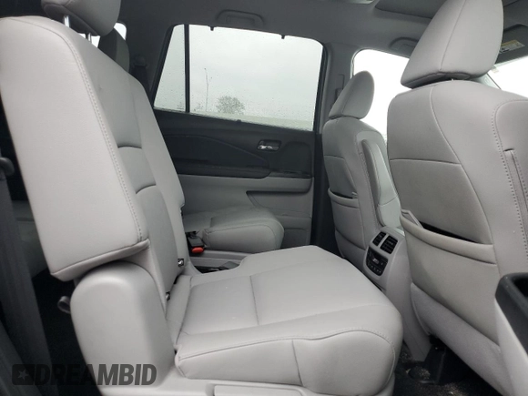 2022 Honda Pilot Touring 7-Passenger z VIN 5FNYF5H63NB015091, wystawiony jako Copart lot #56323725 z przebiegiem 28 614 mil mil oraz Szkoda całkowita • Salvage title. Historia ofert i sprzedaży dostępna na DreamBid. Obrazek 11.