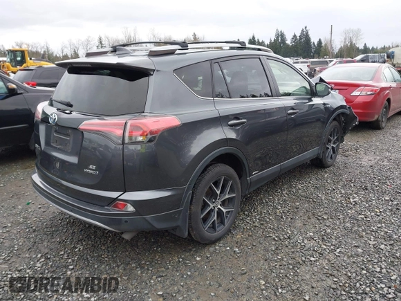 2018 Toyota RAV4 Hybrid SE with VIN JTMJJREV7JD208249, listed as a IAAI auction lot 41859301 with 91,899 mi miles and . Bid and sale history available at DreamBid. Image 4.