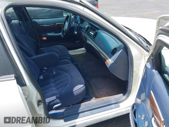 1996 Mercury Grand Marquis GS with VIN 2MELM74WXTX650841, listed as a IAAI auction lot 41936608 with 205,964 mi miles and . Bid and sale history available at DreamBid. Image 5.