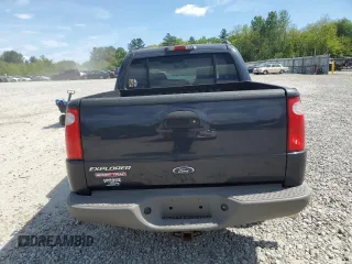 2001 Ford Explorer Sport Trac z VIN 1FMZU77E61UB01605, wystawiony jako Copart lot #56976175 z przebiegiem 106 313 mil mil oraz Tytuł czysty. Historia ofert i sprzedaży dostępna na DreamBid. Obrazek 6.