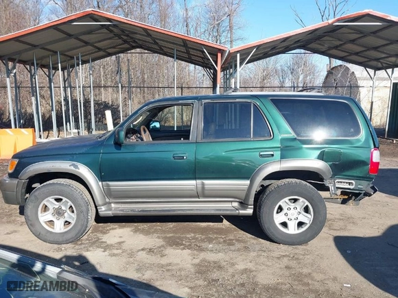 1999 Toyota 4Runner Limited with VIN JT3HN87R7X0226901, listed as a IAAI auction lot 41630780 with 283,379 mi miles. Bid and sale history available at carsss.com. Image 14.