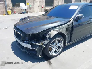 2014 BMW 5 Series 535i with VIN WBA5B1C51ED479359, listed as a IAAI auction lot 42396160 with 149,522 mi miles and . Bid and sale history available at DreamBid. Image 6.
