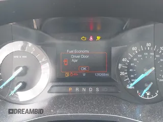 2013 Ford Fusion SE with VIN 3FA6P0HR2DR241420, listed as a IAAI auction lot 42341638 with 128,268 mi miles and . Bid and sale history available at DreamBid. Image 7.