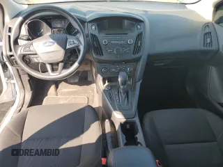 2017 Ford Focus SE with VIN 1FADP3F26HL313478, listed as a Copart auction lot 57078015 with 56,807 mi miles and Salvage title. Bid and sale history available at DreamBid. Image 8.