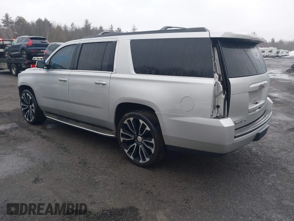 2015 GMC Yukon XL SLT with VIN 1GKS2HKC0FR287860, listed as a IAAI auction lot 41638921 with 213,214 mi miles. Bid and sale history available at carsss.com. Image 3.