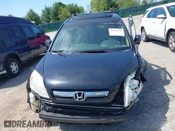 2009 Honda CR-V EX-L with VIN 5J6RE48799L068756, listed as a IAAI auction lot 42142229 with 198,920 mi miles and . Bid and sale history available at carsss.com. Image 12.