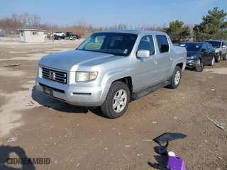 2006 Honda Ridgeline RTL with VIN 2HJYK16576H555999, listed as a IAAI auction lot 42023875 with 202,128 mi miles. Bid and sale history available at carsss.com. Image 2.