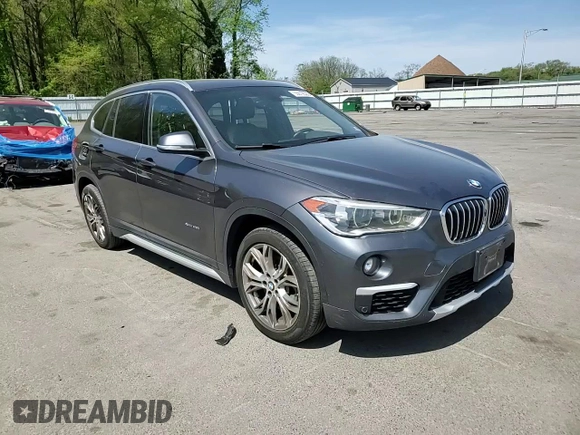 2017 BMW X1 xDrive28i z VIN WBXHT3Z37H4A54544, wystawiony jako Copart lot #55019535 z przebiegiem 76 822 mil mil oraz Szkoda całkowita • Salvage title. Historia ofert i sprzedaży dostępna na DreamBid. Obrazek 13.