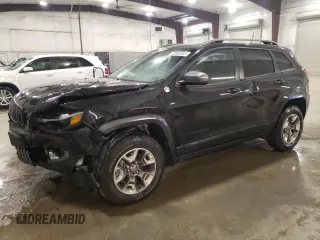 2020 Jeep Cherokee Trailhawk z VIN 1C4PJMBX1LD632984, wystawiony jako Copart lot #50585305 z przebiegiem 42 807 mil mil oraz Szkoda całkowita • Salvage title. Historia ofert i sprzedaży dostępna na DreamBid. Obrazek 1.
