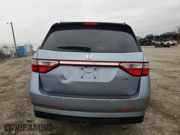 2012 Honda Odyssey Touring with VIN 5FNRL5H92CB127191, listed as a Copart auction lot 44720295 with Not Provided miles and Salvage Title. Bid and sale history available at DreamBid. Image 6.