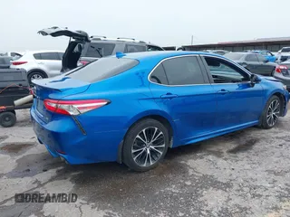 2019 Toyota Camry LE z VIN 4T1B11HK6KU217769, wystawiony jako IAAI lot #41900518 z przebiegiem 104 604 mil mil oraz . Historia ofert i sprzedaży dostępna na DreamBid. Obrazek 4.