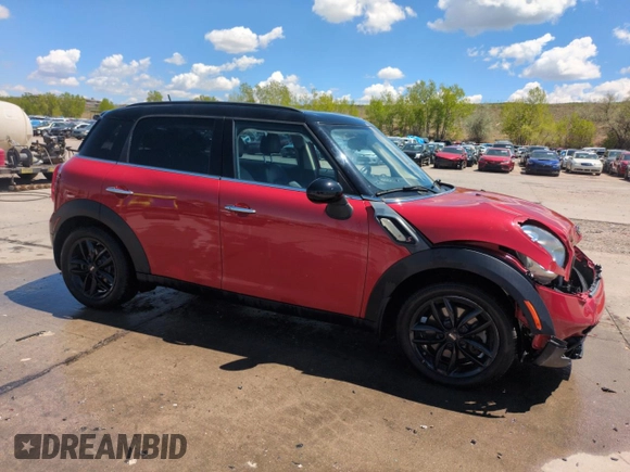 2015 MINI Countryman S with VIN WMWZC3C58FWT06695, listed as a Copart auction lot 56408325 with 99,673 mi miles and Salvage title. Bid and sale history available at DreamBid. Image 4.