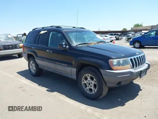 2001 Jeep Grand Cherokee Laredo z VIN 1J4GW48S31C579926, wystawiony jako IAAI lot #42331094 z przebiegiem Nie podano mil oraz . Historia ofert i sprzedaży dostępna na DreamBid. Obrazek 1.