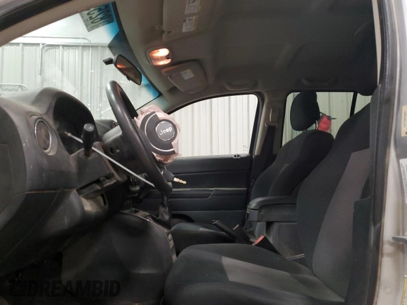 2011 Jeep Compass with VIN 1J4NT1FB0BD245673, listed as a Copart auction lot 82597074 with 207,695 mi miles and Clean Title. Bid and sale history available at carsss.com. Image 7.