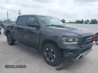 2019 Ram 1500 Rebel with VIN 1C6SRFLT0KN845113, listed as a IAAI auction lot 42307570 with 114,396 mi miles and . Bid and sale history available at DreamBid. Image 1.