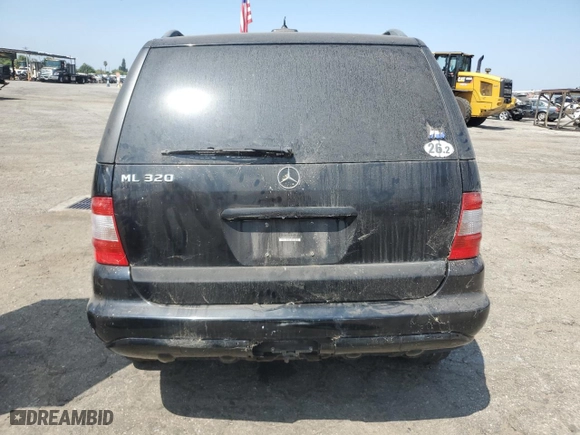2002 Mercedes-Benz M-Class with VIN 4JGAB54E32A338132, listed as a Copart auction lot 67854164 with 0 mi miles and Salvage Title. Bid and sale history available at carsss.com. Image 6.