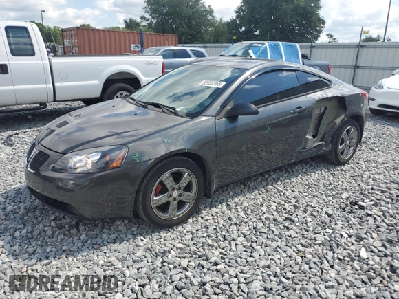 2007 Pontiac G6 GT with VIN 1G2ZH18NX74127920, listed as a Copart auction lot 52950365 with 127,428 mi miles and Salvage title. Bid and sale history available at DreamBid. Image 1.