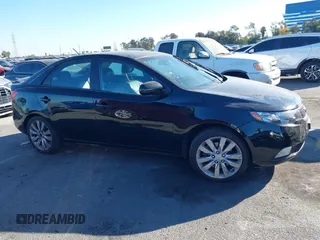 2012 Kia Forte SX with VIN KNAFW4A32C5623357, listed as a IAAI auction lot 41324098 with 217,354 mi miles. Bid and sale history available at carsss.com. Image 12.