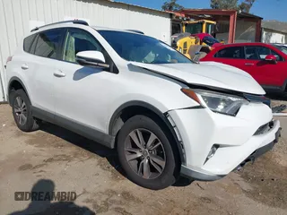 2017 Toyota RAV4 XLE with VIN JTMWFREV9HJ128521, listed as a IAAI auction lot 41658054 with 106,788 mi miles and . Bid and sale history available at DreamBid. Image 1.