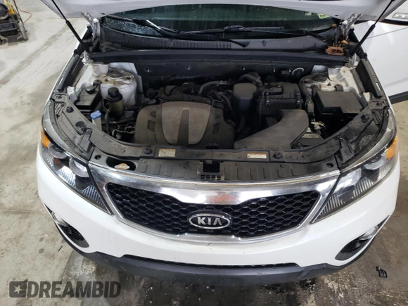 2012 Kia Sorento EX z VIN 5XYKU4A25CG271932, wystawiony jako Copart lot #51371565 z przebiegiem 208 398 mil mil oraz Nie do naprawy • Non repairable. Historia ofert i sprzedaży dostępna na DreamBid. Obrazek 12.