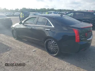 2014 Cadillac ATS Standard RWD z VIN 1G6AA5RA8E0167775, wystawiony jako IAAI lot #41972796 z przebiegiem 145 443 mil mil oraz . Historia ofert i sprzedaży dostępna na DreamBid. Obrazek 3.