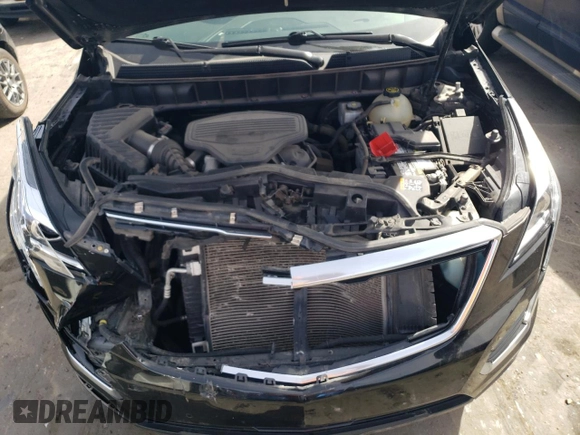 2019 Cadillac XT5 Luxury AWD z VIN 1GYKNDRS1KZ286553, wystawiony jako Copart lot #47105245 z przebiegiem 76 113 mil mil oraz Szkody całkowita. Historia ofert i sprzedaży dostępna na DreamBid. Obrazek 12.