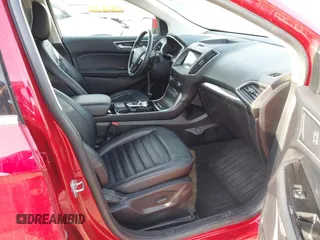 2020 Ford Edge SEL z VIN 2FMPK4J93LBA24658, wystawiony jako IAAI lot #41930062 z przebiegiem 79 235 mil mil oraz . Historia ofert i sprzedaży dostępna na DreamBid. Obrazek 5.