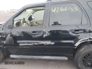 2005 Mercury Mariner Luxury z VIN 4M2CU57115DJ33938, wystawiony jako IAAI lot #42162155 z przebiegiem 174 834 mil mil oraz . Historia ofert i sprzedaży dostępna na DreamBid. Obrazek 14.