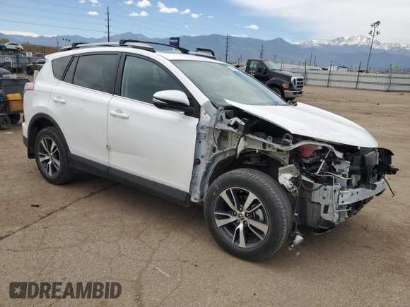 2018 Toyota RAV4 XLE with VIN 2T3RFREV2JW733050, listed as a Copart auction lot 53114585 with Not Provided miles and Salvage Title. Bid and sale history available at DreamBid. Image 4.