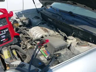2004 Hyundai Santa Fe GLS with VIN KM8SC73E94U665022, listed as a IAAI auction lot 43022376 with 220,295 mi miles and . Bid and sale history available at DreamBid. Image 13.