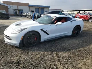 2015 Chevrolet Corvette Z51 2LT with VIN 1G1YK2D75F5117142, listed as a Copart auction lot 70713124 with 39,450 mi miles and Salvage Title. Bid and sale history available at carsss.com. Image 1.