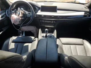 2019 BMW X6 xDrive50i with VIN 5UXKU6C56K0Z67074, listed as a Copart auction lot 65494064 with 97,702 mi miles and Salvage Title. Bid and sale history available at carsss.com. Image 8.