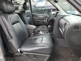 2006 GMC Envoy SLE with VIN 1GKDT13S462228967, listed as a Copart auction lot 73669484 with 233,349 mi miles and Salvage Title. Bid and sale history available at DreamBid. Image 7.