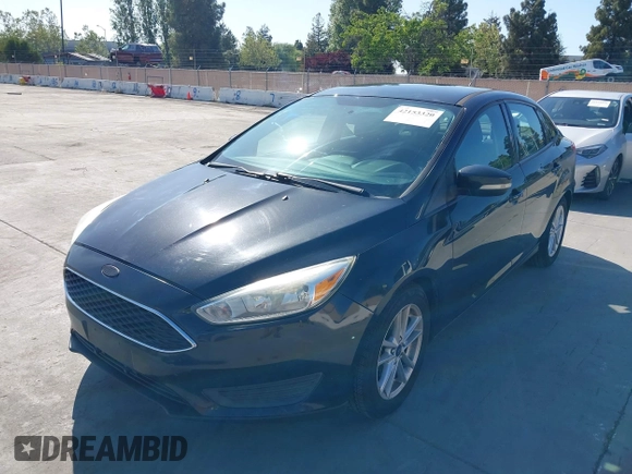2015 Ford Focus SE with VIN 1FADP3F23FL313614, listed as a IAAI auction lot 42153320 with 121,346 mi miles. Bid and sale history available at carsss.com. Image 6.