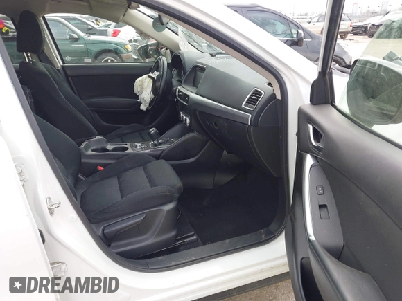 2016 Mazda CX-5 Touring with VIN JM3KE2CY1G0888850, listed as a IAAI auction lot 41562701 with 1 mi miles. Bid and sale history available at carsss.com. Image 5.