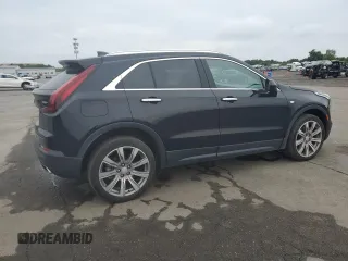 2021 Cadillac XT4 AWD Luxury with VIN 1GYFZBR4XMF014647, listed as a Copart auction lot 63800444 with 49,724 mi miles and Salvage Title. Bid and sale history available at carsss.com. Image 3.