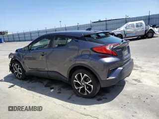 2021 Toyota C-HR LE with VIN JTNKHMBX1M1115317, listed as a Copart auction lot 56200305 with 82,237 mi miles and Clean Title. Bid and sale history available at DreamBid. Image 2.