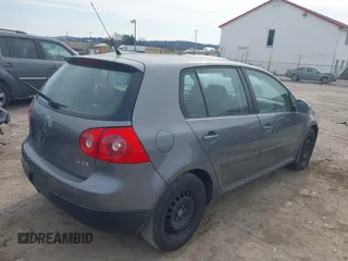 2009 Volkswagen Rabbit S with VIN WVWDA71K39W004559, listed as a IAAI auction lot 41685929 with 206,793 mi miles. Bid and sale history available at carsss.com. Image 4.
