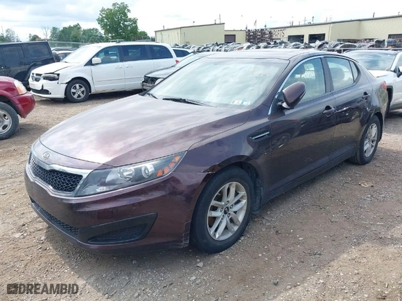 2011 Kia Optima LX with VIN KNAGM4A73B5063778, listed as a IAAI auction lot 39932051 with 143,175 mi miles. Bid and sale history available at carsss.com. Image 2.