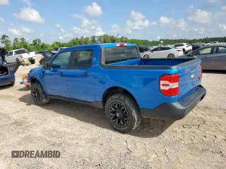 2022 Ford Maverick XL z VIN 3FTTW8E97NRA93740, wystawiony jako Copart lot #56571635 z przebiegiem 23 055 mil mil oraz Szkoda całkowita • Salvage title. Historia ofert i sprzedaży dostępna na DreamBid. Obrazek 2.