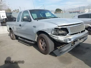 2002 Ford F-150 XL with VIN 1FTRX17262NB99755, listed as a IAAI auction lot 41181246 with 1 mi miles. Bid and sale history available at carsss.com. Image 1.