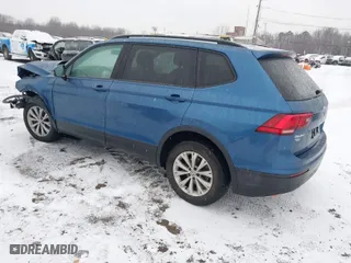 2018 Volkswagen Tiguan S with VIN 3VV0B7AX8JM081263, listed as a IAAI auction lot 41245308 with 58,778 mi miles. Bid and sale history available at carsss.com. Image 3.
